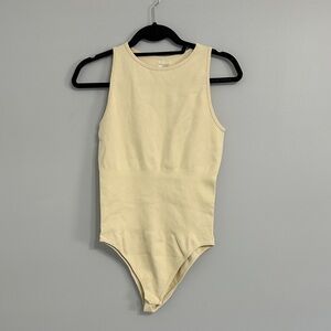 NWOT Elegant Cream Sleeveless Bodysuit